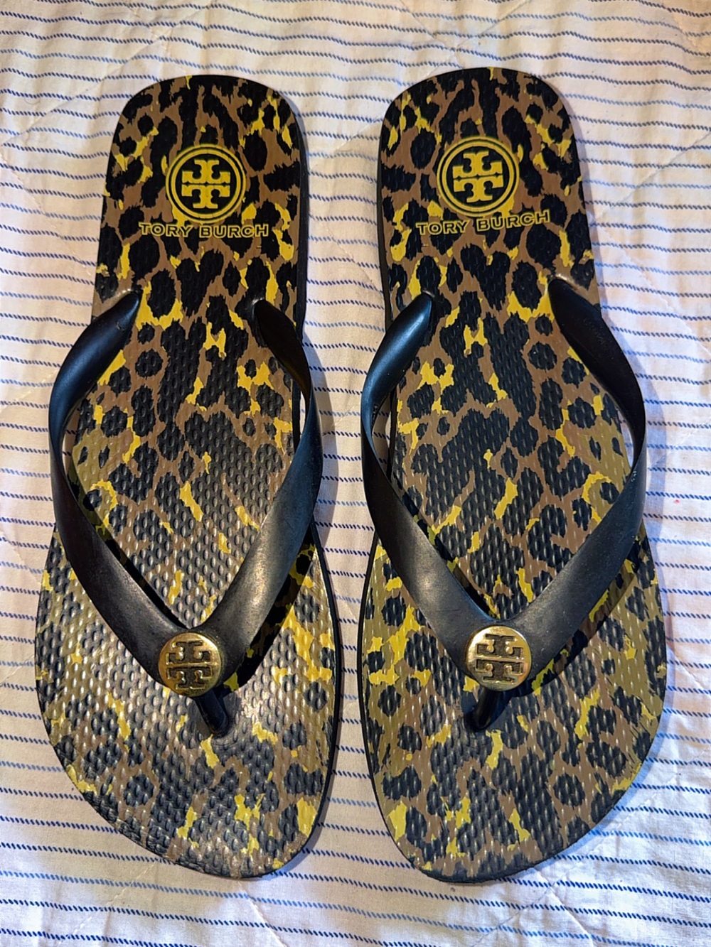 Tory Burch Black and Brown Leopard Flip Flops with Gold Logo